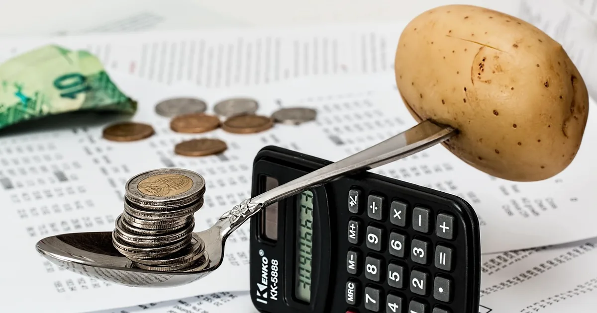 A calculator and budget planning documents