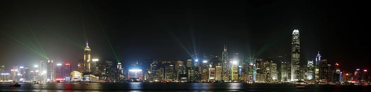 Hong Kong skyline at night, representing the Hong Kong to Singapore pet import route